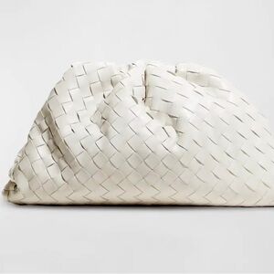 Bottega Veneta The Pouch in signature intrecciato woven lambskin leather